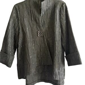 IC Stylish Black top. Asymmetric with a shimmer in it. Sz lg